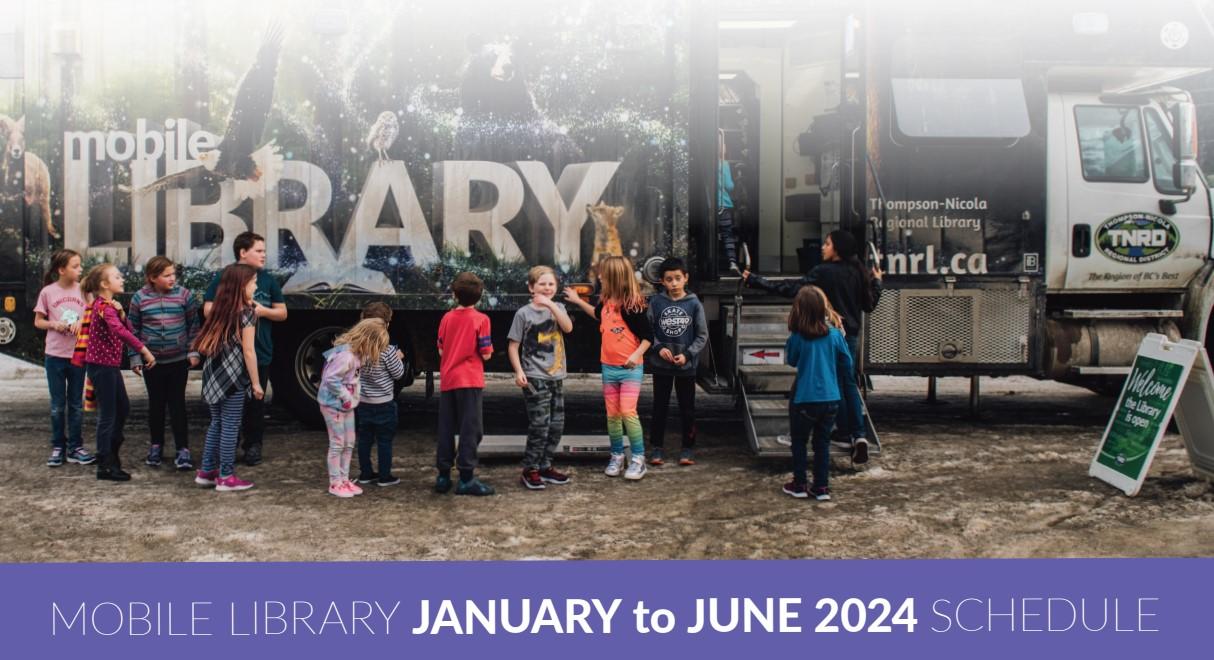 Children lining up outside the Thompson-Nicola mobile library.